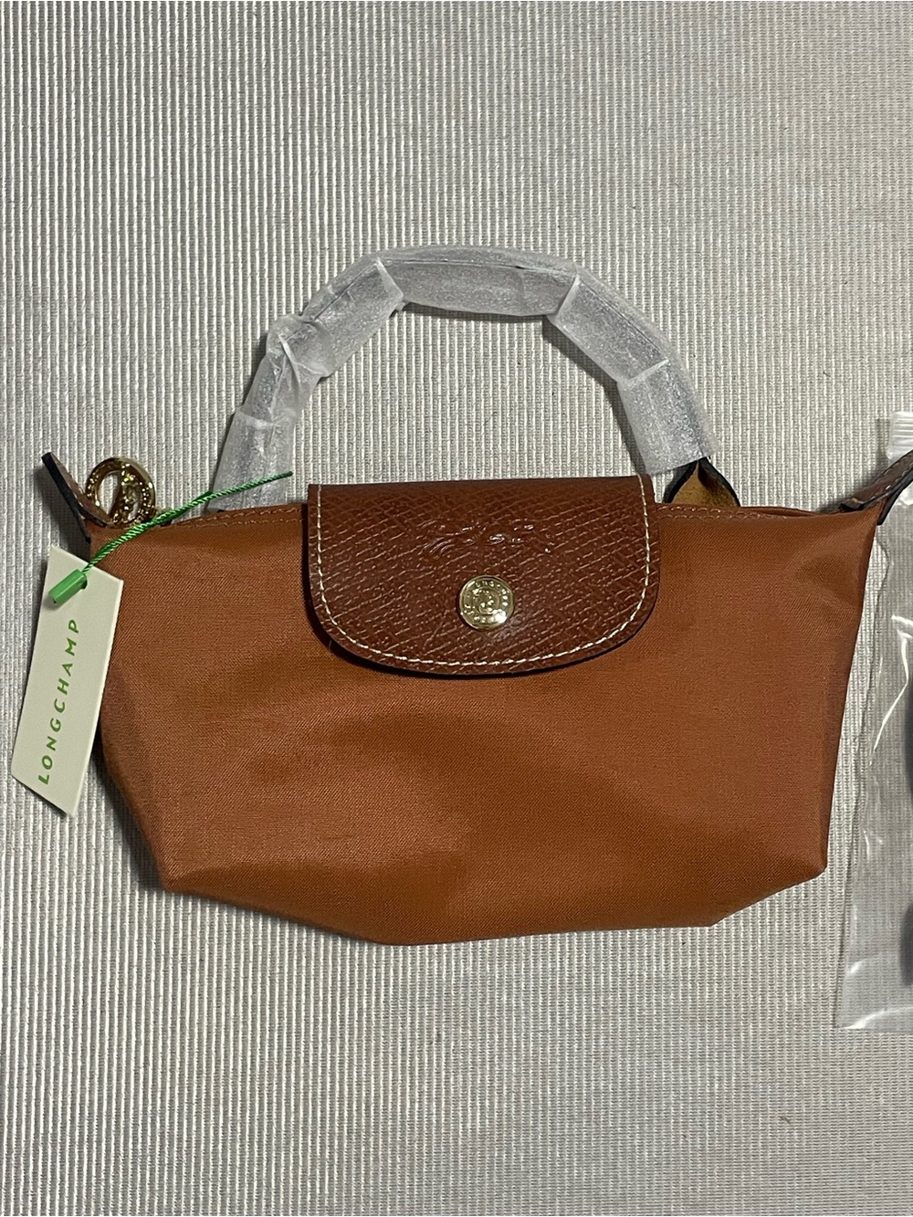 Longchamp Small Mini Le Pliage Top-Handle Bag in Brown
